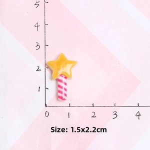 Detail view of yellow resin star charm showing 1.5x2.2cm dimensions for DIY crafts
