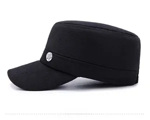 Side view of black wool military cap with silver five-pointed star metal badge