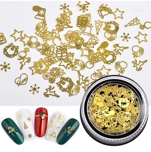 Kit de breloques dorées de Noël pour nail art avec flocons et rennes en boîte ronde