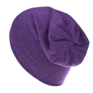 Detailed texture of dark purple cotton slouchy beanie for kids in soft knitted fabric