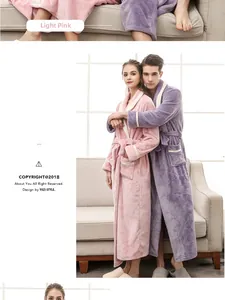 Detail showing plush flannel bathrobes in pink and purple with contrast white piping