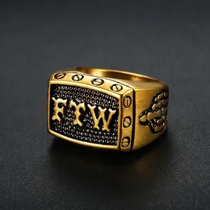 Gold stainless steel FTW biker ring with gothic lettering and skull hand relief