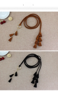 Detailed view of woven tassel waist belts in brown and black with gold metal rings