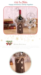 Detail of Christmas wine bottle cover with faux fur collar, wood buttons and burlap bow