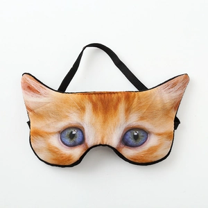 Detail of 3D creative cat face sleep mask with realistic orange fur print and elastic band