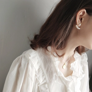 Elegant 925 sterling silver pearl fan earrings and gold necklace on female model