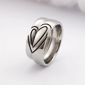 Polished silver titanium steel couple rings with creative matching heart design