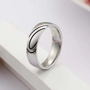 Minimalist silver steel couple ring featuring a symmetrical black U-shaped pattern design