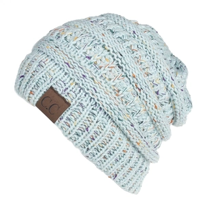 Detail of light blue confetti knit beanie with embossed brown C.C leather patch