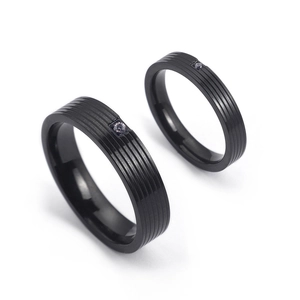 Black titanium steel couple rings with vertical stripes and centered zircon stone