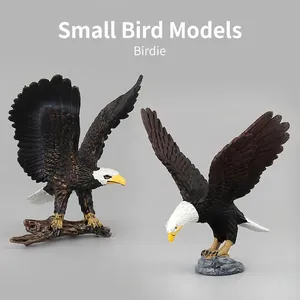 Realistic bald eagle bird figurines with white head and brown body on stands