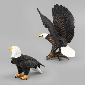 Realistic bald eagle bird figurines with white head and yellow beak in two poses