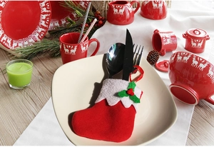 Christmas stocking silverware holder in red felt for holiday table setting decor