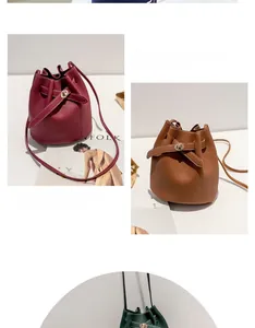Close-up of bucket bags in burgundy, brown and green with metal turn-lock and drawstrings