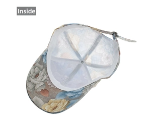 Detailed inside view of floral lace baseball cap showing white inner lining and stitching