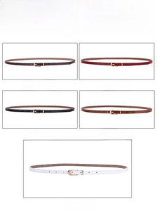 Detail view of five thin leather belts in coffee, red, black, brown, and white colors
