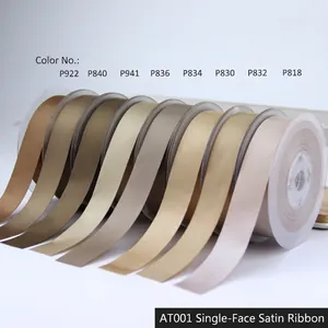 Polyester satin ribbons in beige and champagne tones for gift wrapping decoration