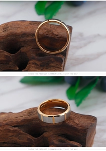 Macro detail of brushed stainless steel ring with gold accents and polished inner band