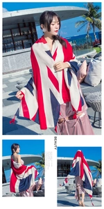 Detail of national style cotton linen scarf with Union Jack pattern and red fringe edges