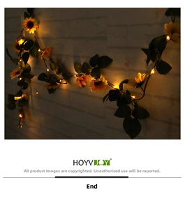 Detail of warm yellow LED lights glowing inside fabric sunflower petals on decorative string