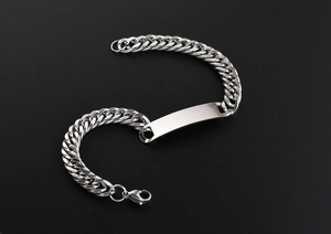 Polished stainless steel Cuban link bracelet featuring a blank rectangular metal plate