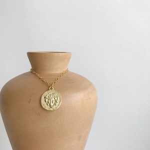 Vintage 925 sterling silver chain bracelet with a gold coin portrait relief pendant