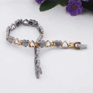 Bracciale magnetico bicolore oro e argento a forma di cuore per uomo e donna