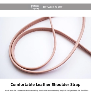 Close-up of comfortable pink leather shoulder strap with reinforced stitching details