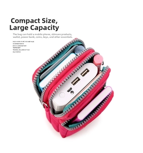 Deep pink multi-layer mini nylon bag showing high capacity for phone and accessories