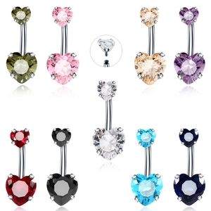 Detailed close-up of heart-shaped zircon belly rings with threaded screw structure