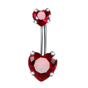 Detailed macro view of silver belly ring with red heart-shaped zircon stones