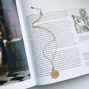 Vintage S925 sterling silver gold-plated coin necklace with 'LIVE TO EXPRESS' engraving
