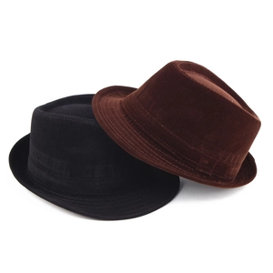 Detail showing the fine corduroy texture of black and brown winter fedora hats for men