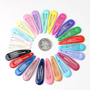 Colorful drip oil BB hair clips arranged in a circle with a coin for size reference