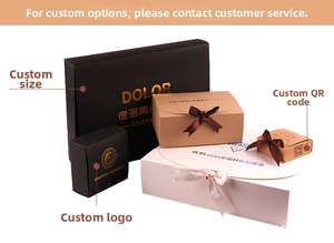 Custom matte black and kraft gift boxes with satin ribbons and gold foil printing