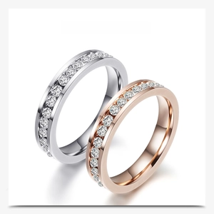 Detail of 4mm eternity rings in silver and rose gold with pavé set cubic zirconia