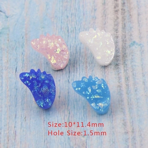 Detailed macro view of 10x11.4mm resin opal baby feet beads with 1.5mm holes