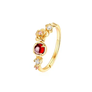 Elegant 925 sterling silver open ring featuring a red garnet and golden rose flower
