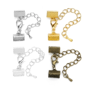 Close-up of ribbon ends, lobster clasps and extension chains in four metallic finishes