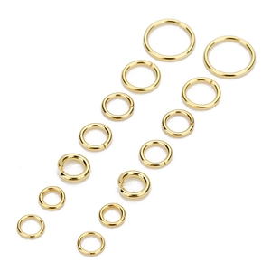 Polished gold stainless steel jump rings in various sizes for DIY jewelry making