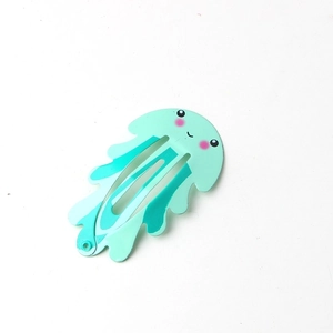 Detail of light blue jellyfish BB hair clip with cute cartoon face for kids