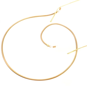 Polished gold flat snake chain eyewear strap with non-slip rubber loops in a spiral layout