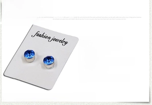 Detailed specs of 6mm blue rhinestone magnetic stud earrings with steel backings