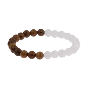Detail of beaded bracelet with dark wood grain beads and translucent white crystal stones