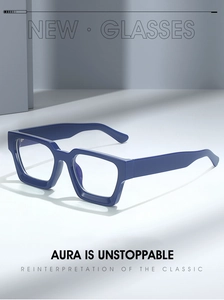 Detail of dark blue thick square frame glasses with a polished finish and clear lenses