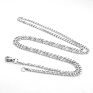 Detailed view of silver stainless steel curb chain with secure lobster clasp closure