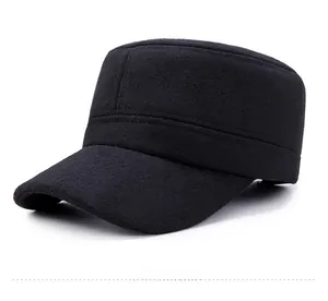 Detailed side view of black flat top cap with silver star emblem in thick wool fabric
