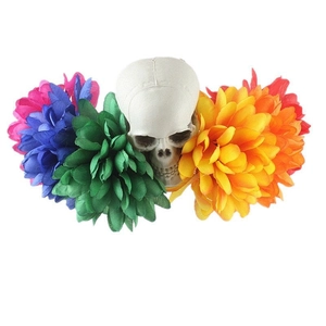 Detail of Day of the Dead headband with sugar skull and colorful faux peonies