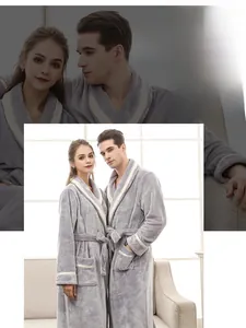 Close-up of thick grey mink fleece bathrobe showing contrast trim and plush texture