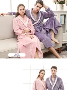 Detail of contrasting white trim on thick flannel robes for couples in pink and purple